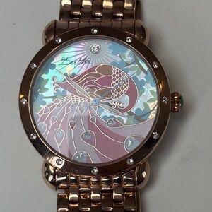 Pink Peacock Faced Watch With Rose Gold Colored Metal Band
